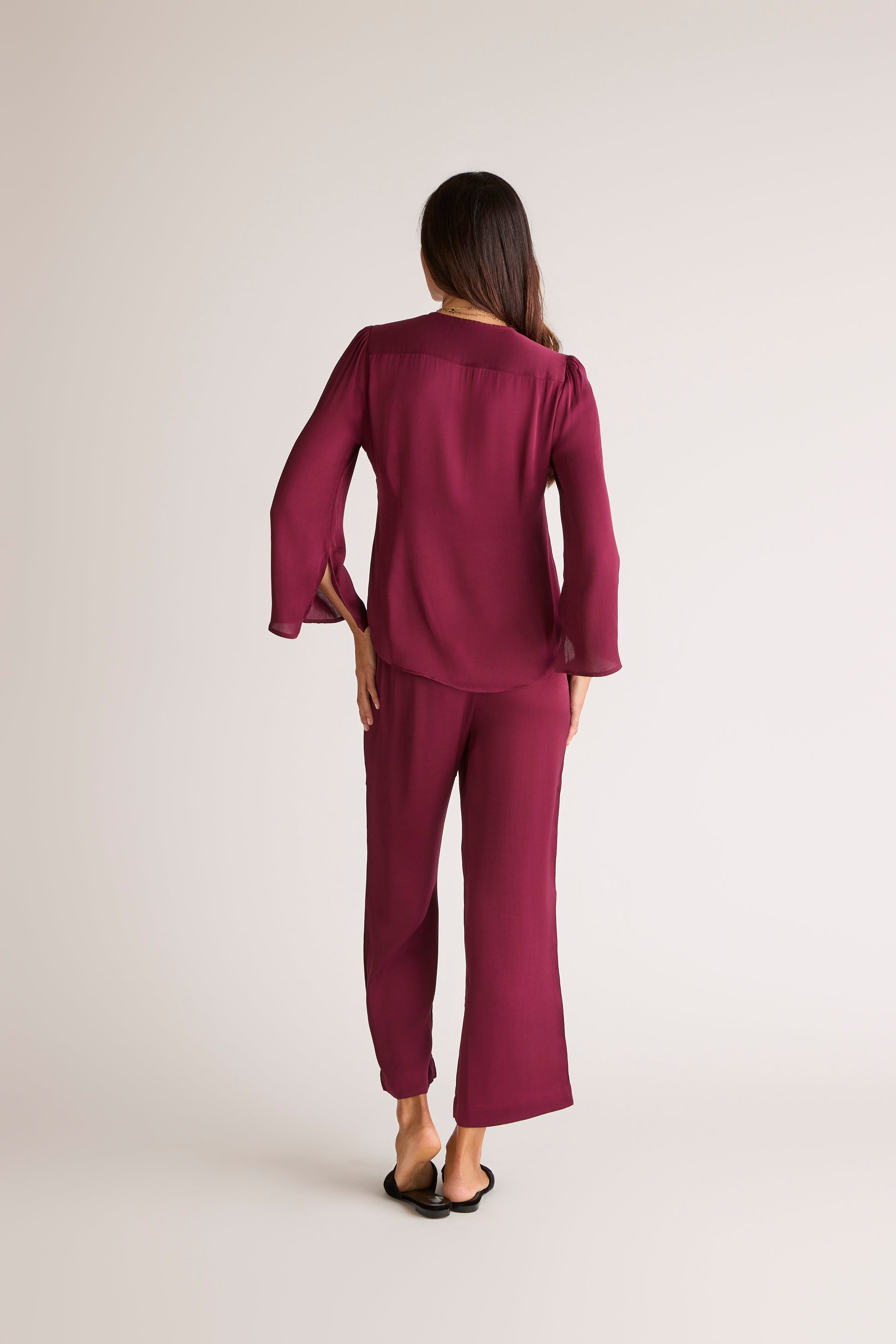 The Sōlune Muse Set Dark Cherry — chic satin resortwear set with lace-up top and wide-leg satin lounge pants in dark cherry